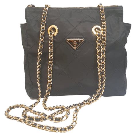 prada purse gold|prada black and gold bag.